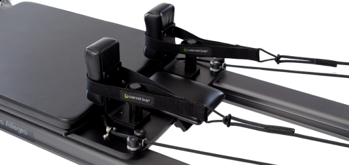 Smooth Pilates reformer carriage with TwistLock shoulder rests.