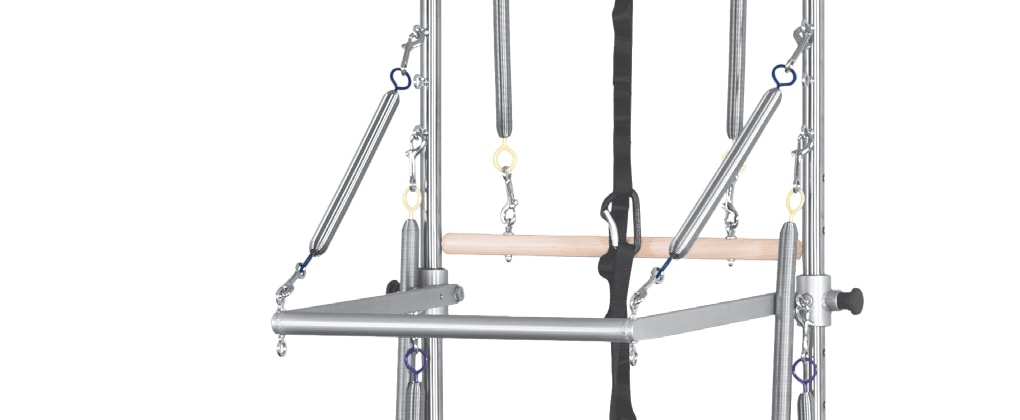 Pilates reformer tower with versatile training functionalities