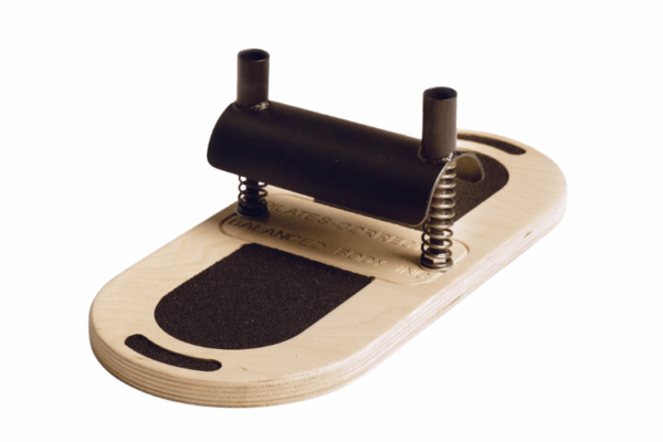 Foot Corrector for Strength and Balance Balanced Body Foot Corrector with dual springs and non-slip base.