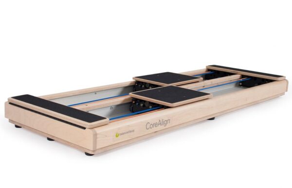 CoreAlign Professional Pilates Equipment CoreAlign exercise device with dual tracks and independent carts.