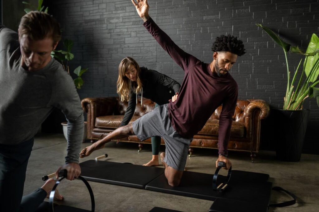 Pilates practitioners using Spring Circle for exercises.