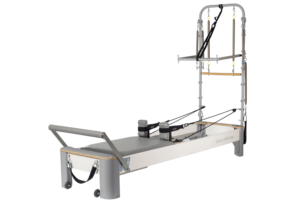 Bravo Reformer with Tower modern Pilates equipment.