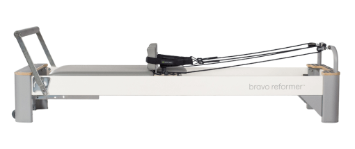 Eco-friendly Pilates Reformer with Durable Frame and Legs Pilates Reformer with recycled polywood frame and aluminum legs featuring transport wheels and non-slip platform.